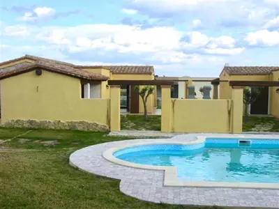 Piscina di Villas with shared pool in Costa Rei just 500 meters from the sea o nelle vicinanze