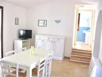 TV o dispositivi per l'intrattenimento presso ISA-Villas with shared pool in Costa Rei just 500 meters from the sea