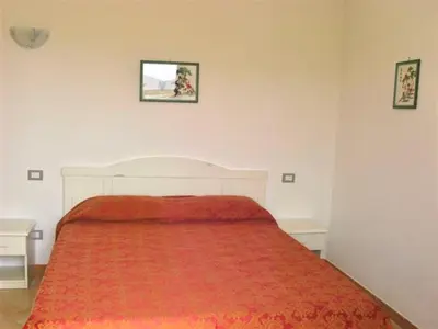 Letto o letti in una camera di ISA-Villas with shared pool in Costa Rei just 500 meters from the sea
