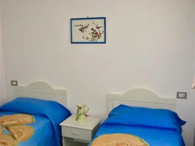 Letto o letti in una camera di ISA-Villas with shared pool in Costa Rei just 500 meters from the sea