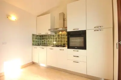 Cucina o angolo cottura di ISA - Villas with private pool in Costa Rei just 500 meters from the sea