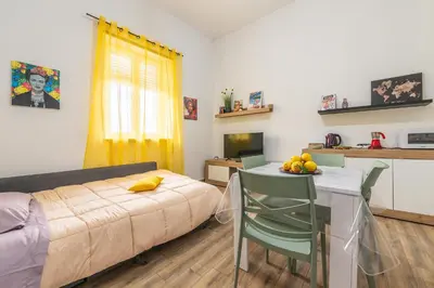 Letto o letti in una camera di Appartamento indipendente Clarò Guesthouse