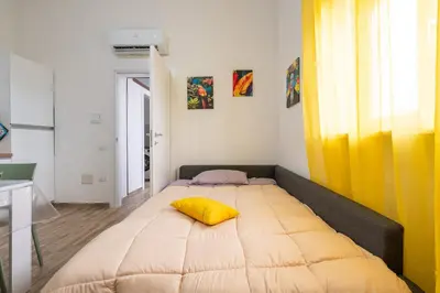 Letto o letti in una camera di Appartamento indipendente Clarò Guesthouse