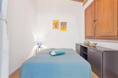 Letto o letti in una camera di La Casa Azzurra