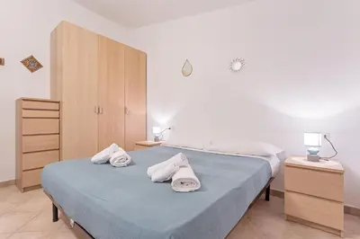 Letto o letti in una camera di La Casa Azzurra
