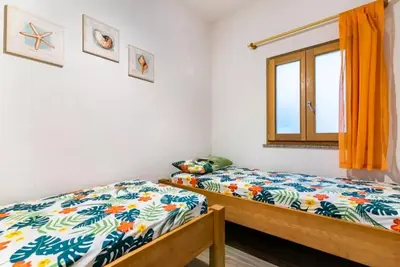 Letto o letti in una camera di La Casa del Geco