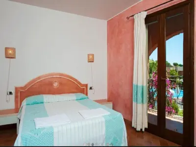 Letto o letti in una camera di Sardinian-style apartment near beach