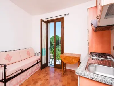Letto o letti in una camera di Sardinian-style apartment near beach