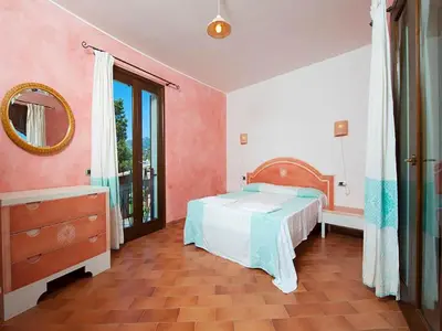Letto o letti in una camera di Coastal Hideaway with Pool