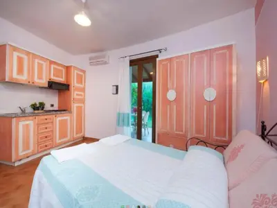 Letto o letti in una camera di Three-room apartment with pool