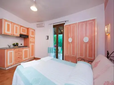 Letto o letti in una camera di Apartment in residence with pool