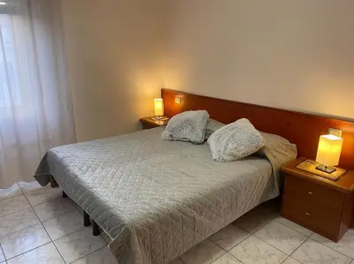 Letto o letti in una camera di Abbracciati dal sole