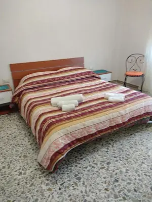 Letto o letti in una camera di Daniela House