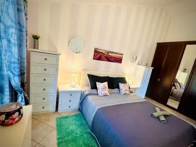 Letto o letti in una camera di Casa Terrazza 9 Sardegna