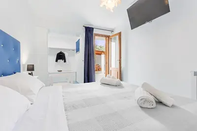 Letto o letti in una camera di Villa Mari