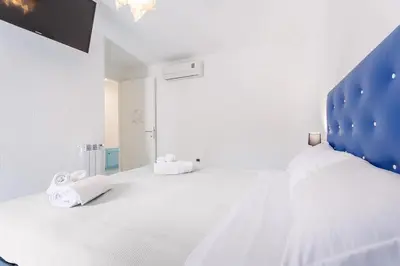Letto o letti in una camera di Villa Mari