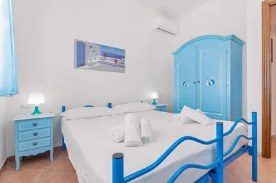 Letto o letti in una camera di Domu Elgive
