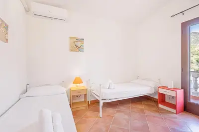 Letto o letti in una camera di Domu Elgive