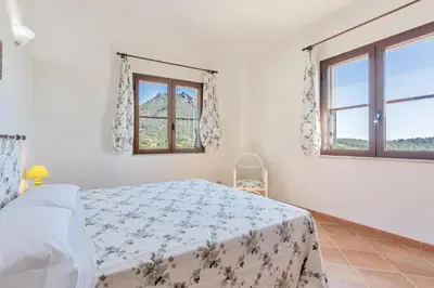 Letto o letti in una camera di Domu Elgive