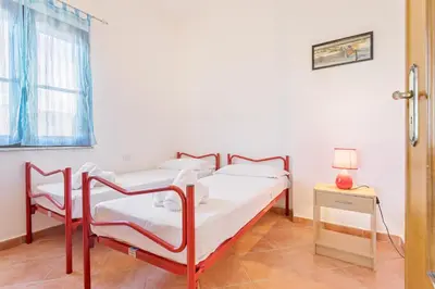 Letto o letti in una camera di Domu Elgive