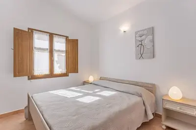 Letto o letti in una camera di La Vetta Blu