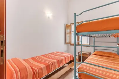 Letto o letti in una camera di La Vetta Blu