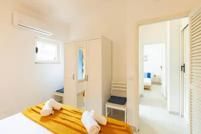 Letto o letti in una camera di Blue Heaven