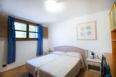 Letto o letti in una camera di Sa Murta