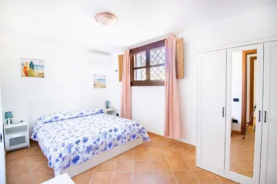 Letto o letti in una camera di Sa Murta