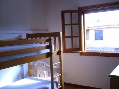 Letto o letti in una camera di Villa Solanas
