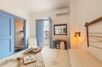 Letto o letti in una camera di B&B Antico Telaio