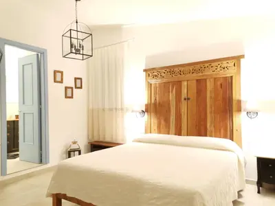 Letto o letti in una camera di B&B Antico Telaio