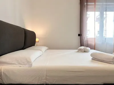 Letto o letti in una camera di Carloforte a Cagliari, Walk to the Center