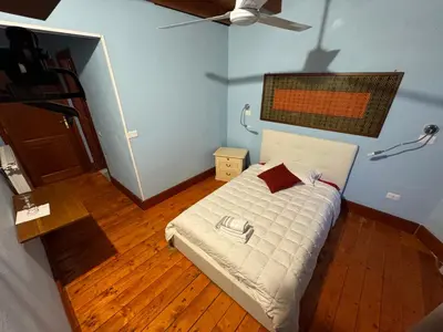 Letto o letti in una camera di B&B Muggianeddu