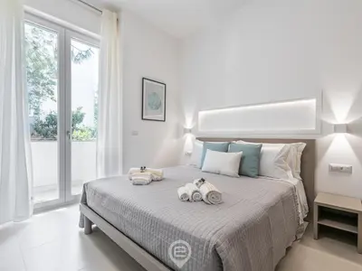 Letto o letti in una camera di Al Parco Studios - Studio Caravaggio