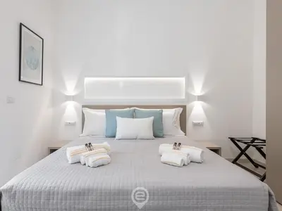 Letto o letti in una camera di Al Parco Studios - Studio Caravaggio