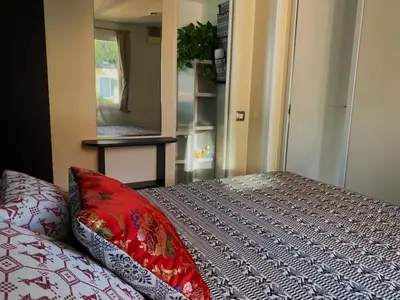 Letto o letti in una camera di Camping Torre di Barisardo