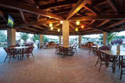 Ristorante o altro punto ristoro di Residence with swimming-pool in Campulongu just 600 mt from the sea