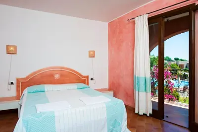 Letto o letti in una camera di Residence with swimming-pool in Campulongu just 600 mt from the sea