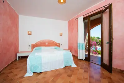 Letto o letti in una camera di Residence with swimming-pool in Campulongu just 600 mt from the sea