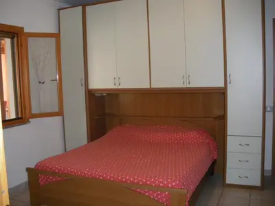 Letto o letti in una camera di Villa Simona giardino & mare