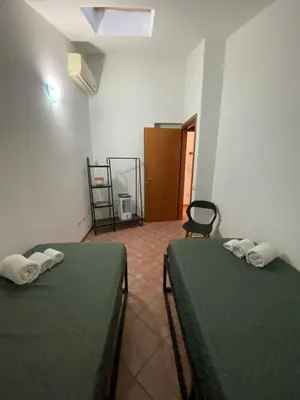 Letto o letti in una camera di DòMu