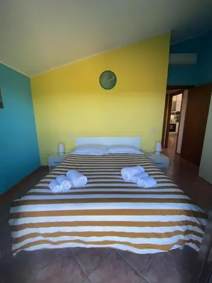Letto o letti in una camera di DòMu