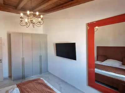 Letto o letti in una camera di Casa Toni, Villasimius