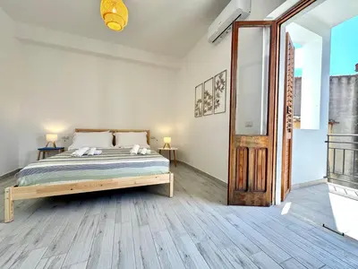 Letto o letti in una camera di Le Corti Sarde Village
