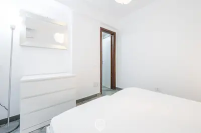 Letto o letti in una camera di Fiorenza's charming beach house