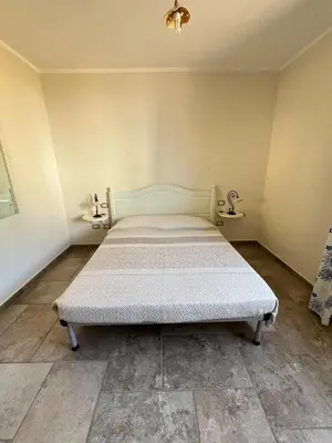 Letto o letti in una camera di Attico Via Roma Villasimius
