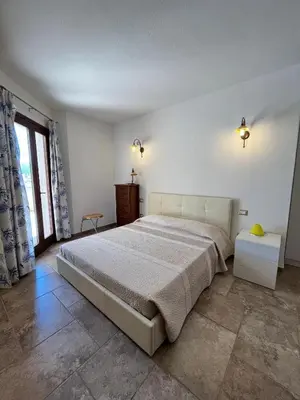 Letto o letti in una camera di Attico Via Roma Villasimius