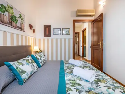 Letto o letti in una camera di Charm in Villanova