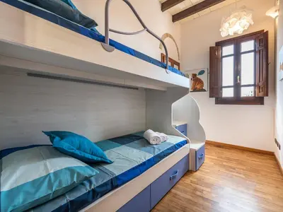 Letto o letti in una camera di Charm in Villanova